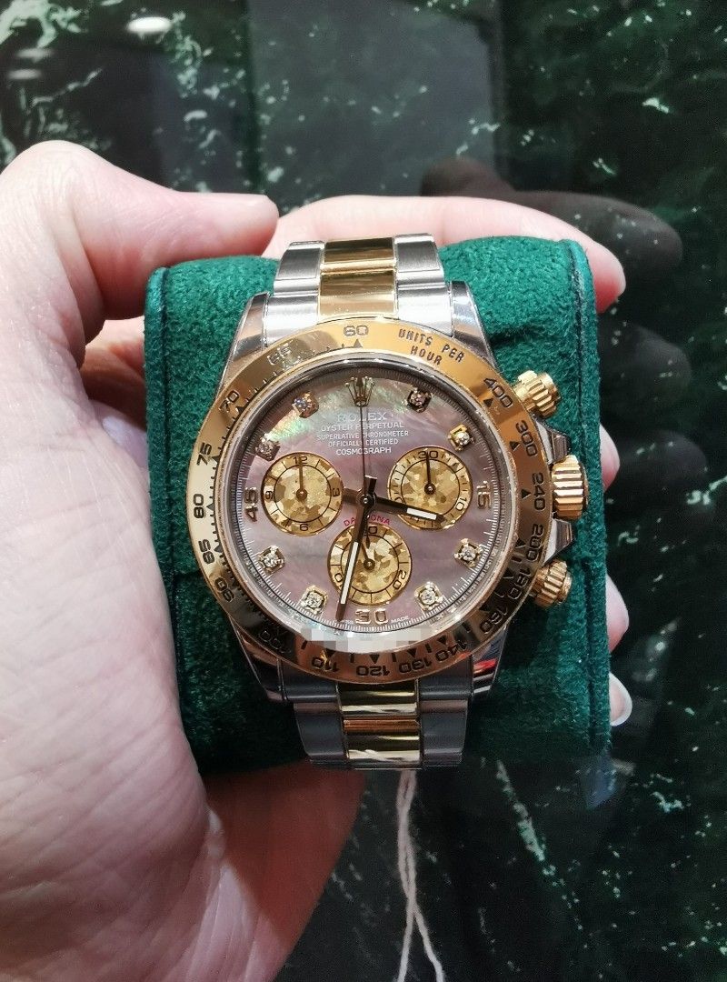 Daytona half gold black dial 2025