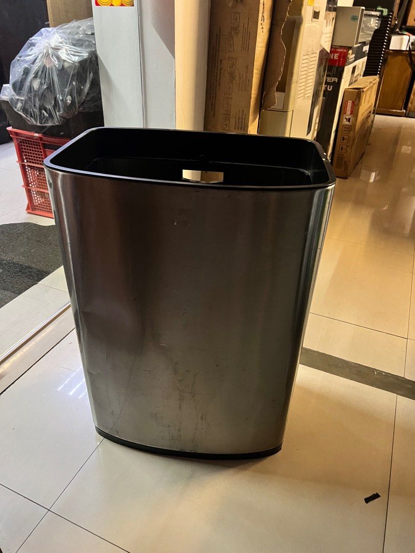 Stainless Trash Bin with small dents (Category: Storage Boxes & Baskets) located in Pasay City. Submitted by meostore (Listing ID 1322764149, Image 3). Description: 24 inch height 17 inch length 12 inch width.