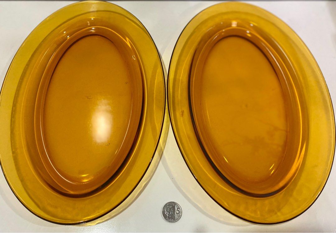 Vintage Amber Serving Platter 2pcs (Category: Other Kitchenware & Tableware) located in Quezon City. Submitted by hellodiva (Listing ID 1322803547, Image 2). Description: 2pcs Serving Platter Vintage Style Brown Glass Size: 14” x 9” x 1” 10/10 condition 📌If it’s posted, it’s still available ❌No Bogus Buyers Please!.