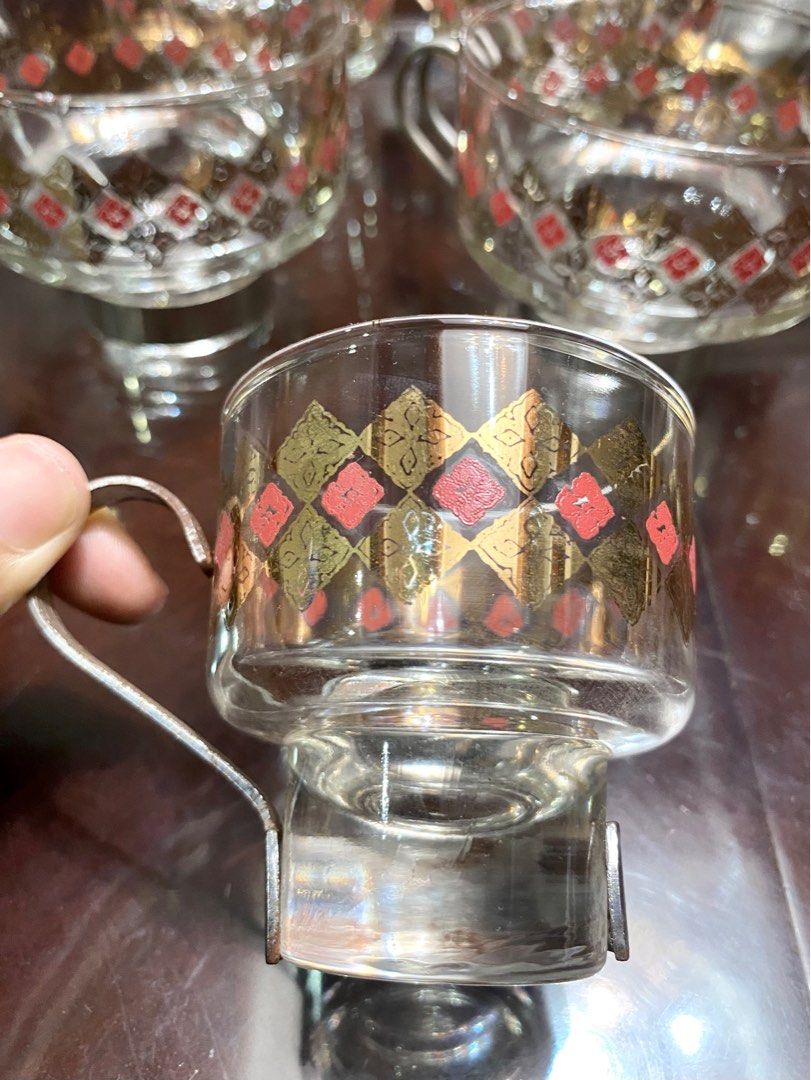 Vintage Glass Mugs 12pcs Set (Category: Coffee & Tea Tableware) located in Quezon City. Submitted by hellodiva (Listing ID 1322795088, Image 2). Description: Vintage Glass Mugs 12 pcs Set 6 Small Cups ( 7cm height x 6.5cm diameter) 6 Large Cups ( 7cm height x 9cm diameter) 4/5pcs w/ some rust on handles. 3pcs with small chip on side. 7/10 condition 📌If it’s posted, it’s still available ❌No Bogus Buyers Please!.