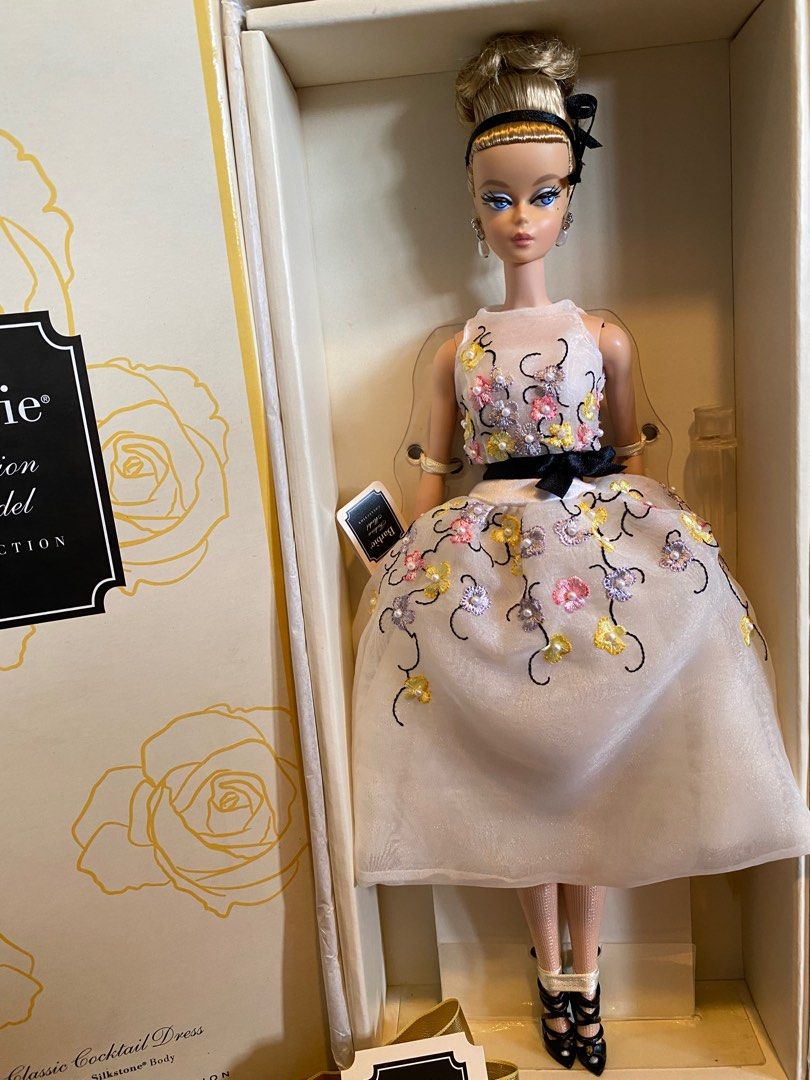 classic cocktail dress barbie The Southern Belle Barbie takes the classic Plantation Belle fashion and reimagines it as a romantic blush cocktail dress with lace accents, while Barbie's auburn bob and unique jewelry lends an edgy