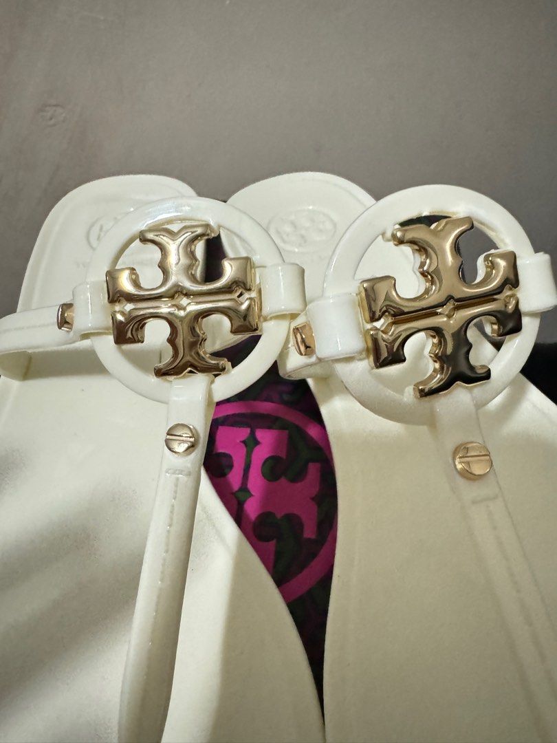 Authentic Tory Burch (Category: Flats & Sandals) located in Makati City. Submitted by everything.peachy (Listing ID 1322908115, Image 2). Description: MINI MILLER FLAT THONG-TPU Ivory Us7 Used once.