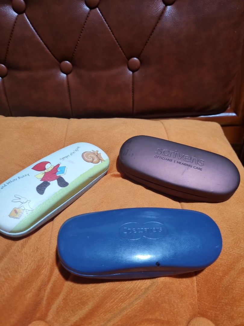 Bundle Eyeglass Cases (Category: Vision Care) located in Paombong. Submitted by sweetdeals0181656 (Listing ID 1323028288, Image 1). Description: Item 1 is Santoro Poppi Lovers with visible scratch on top Item 2 is Specsavers with stain on top Item 3 is Scrivens with flaw as the lower portion of the inside part needs to be reglued..