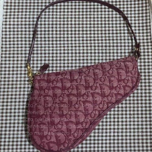 Classic Christian Dior Trotter Monogram Mini Saddle Bag [Authentic] (Category: Luxury Bags & Wallets) located in Caloocan City. Submitted by naeaaa (Listing ID 1323035067, Image 1). Description: Classic Christian Dior Trotter Monogram Mini Saddle Bag [Authentic] • Preloved (onhand) • Vintage • Red, Cotton • Dimension: 8.25”L x 6”H x 2”W • Handle drop: 7.5” • Some minor wear, but generally in good condition. Check the images for details Mode of Pa