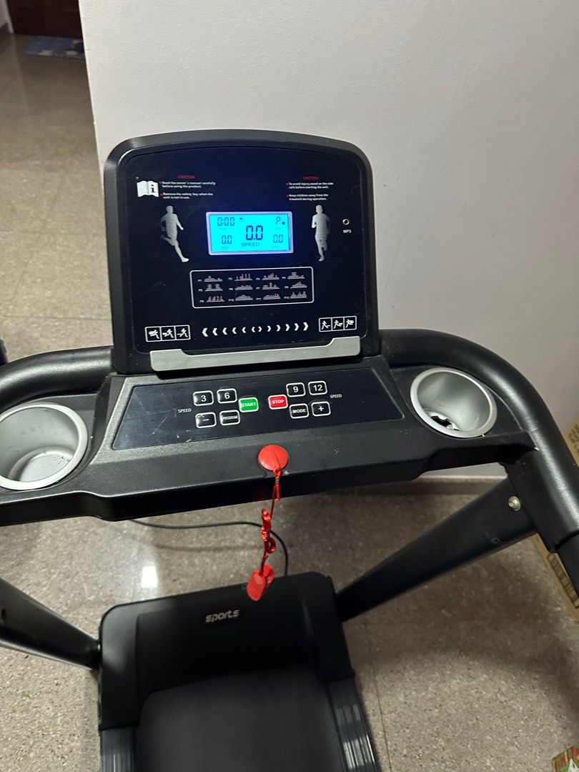 Foldable threadmill (Category: Cardio & Fitness Machines) located in Singapore. Submitted by fishingkakl (Listing ID 1323024856, Image 2). Description: Running treadmill Cup holder Emergency stop Speed up to 12 Diff modes to help you slim down 125cm x 55cm Pls arrange your own delivery Deposit of $100 is required if cod..