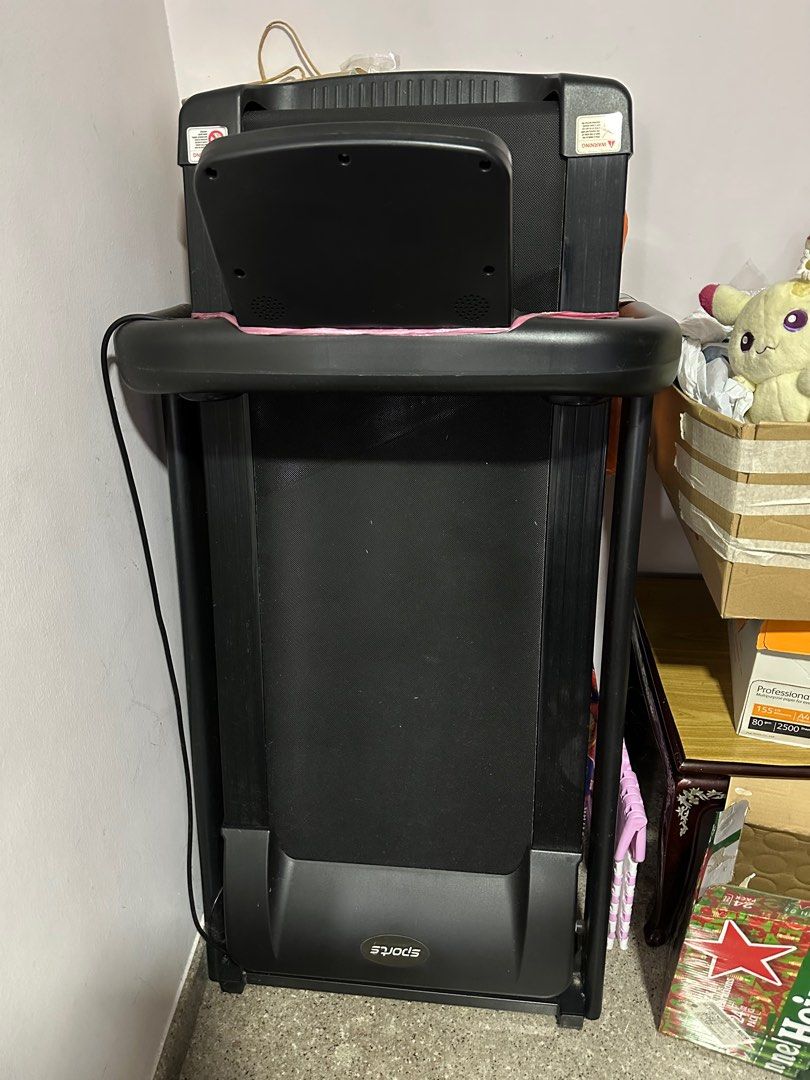 Foldable threadmill (Category: Cardio & Fitness Machines) located in Singapore. Submitted by fishingkakl (Listing ID 1323024856, Image 3). Description: Running treadmill Cup holder Emergency stop Speed up to 12 Diff modes to help you slim down 125cm x 55cm Pls arrange your own delivery Deposit of $100 is required if cod..