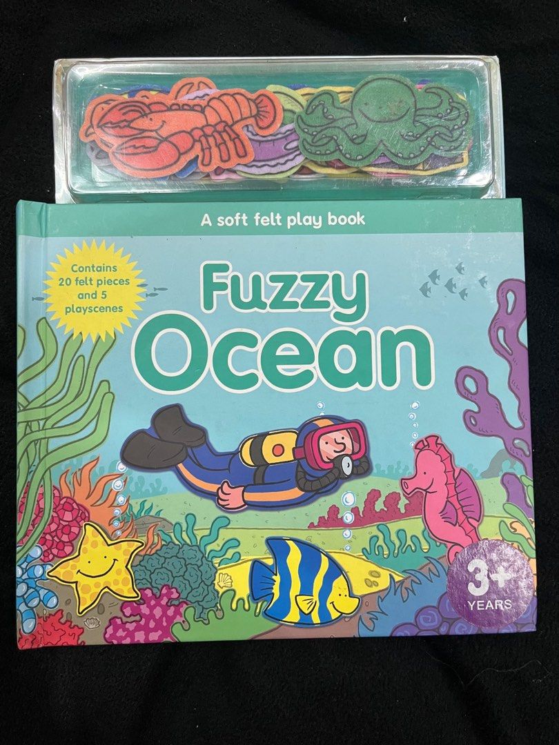Fuzzy Ocean Soft Felt Play Book (Category: Infant Playtime) located in Manila. Submitted by carlalalala35 (Listing ID 1323028784, Image 1). Description: Contains 20 felt pieces & 5 Play scenes for 3+ y/o My son doesn't like it. .