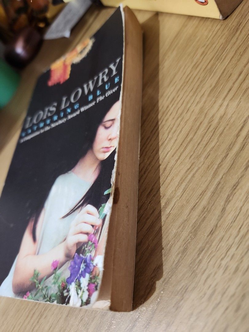 Gathering Blue by Lois Lowry (Category: Storybooks) located in Manila. Submitted by matb_ (Listing ID 1322964772, Image 3). Description: -Paperback -No paper folds -Broken spine -paper discoloration.