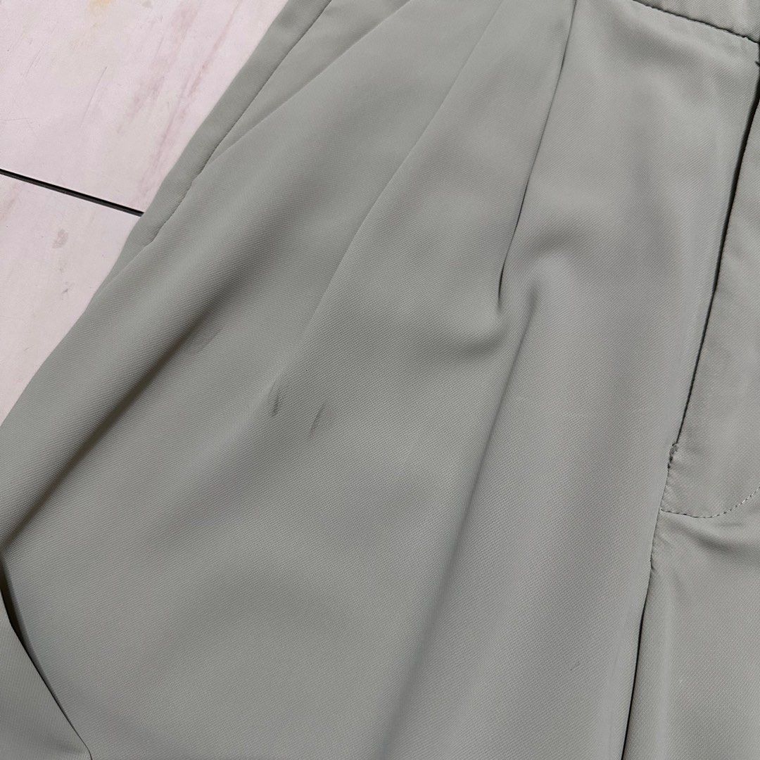Green High-Waisted Pleated Pants (Category: Other Bottoms) located in Manila. Submitted by catchim (Listing ID 1322979461, Image 3). Description: Preloved pants 💚 GOOD CONDITION. Minor Issues •some marks on the right side, but barely noticeable (see photos for reference) Free Size L: 39.5” W: 12.5” Note: measurements are done laid flat PM for more details!.