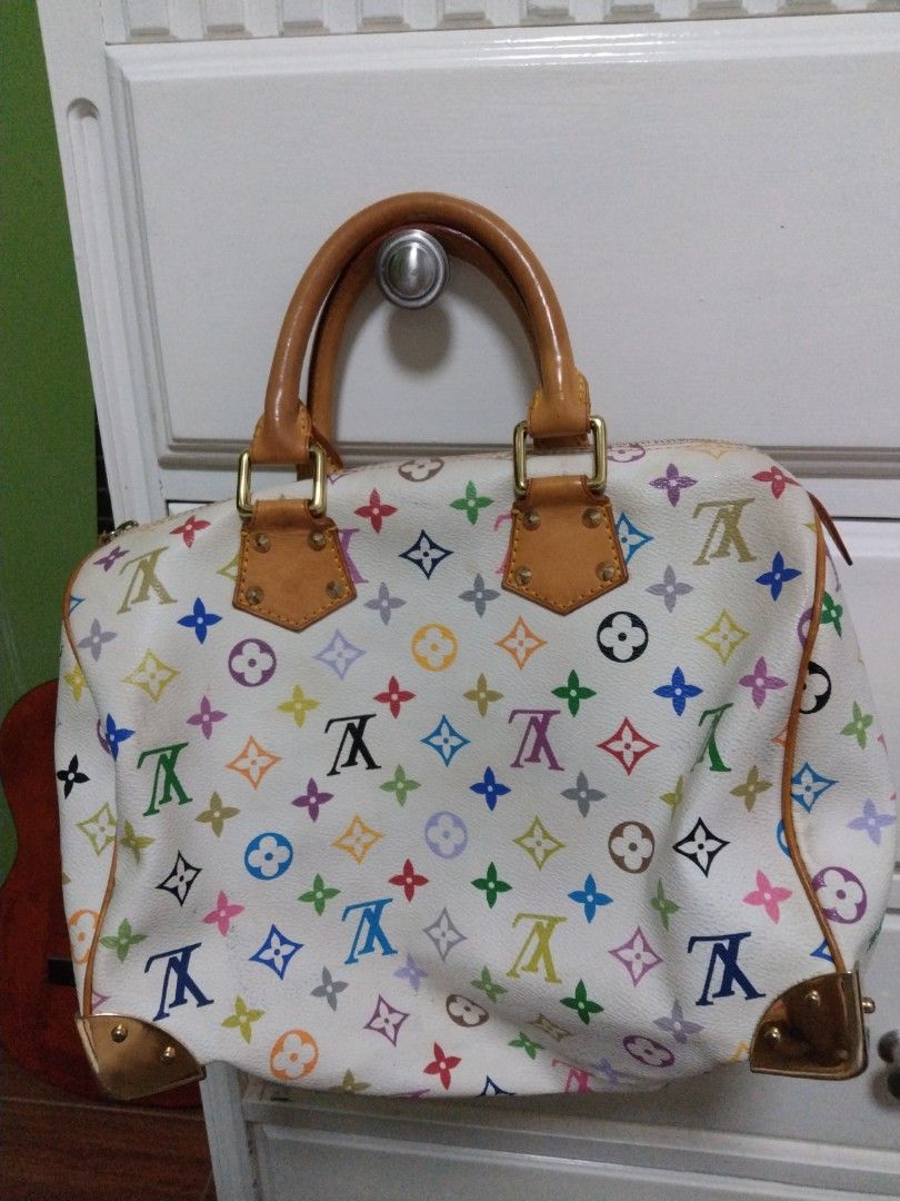 White louis vuitton bag with colored scheduled letters