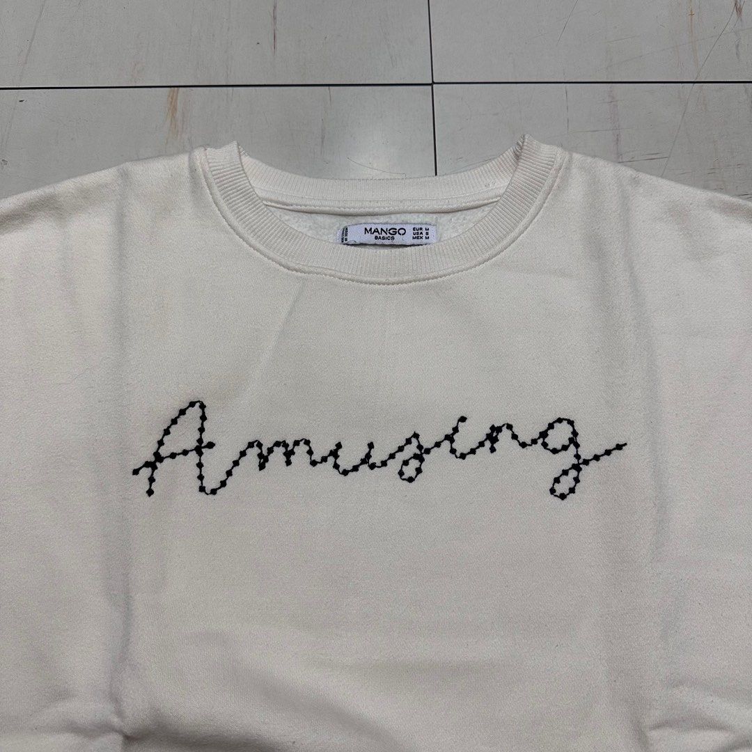 MANGO Embroidered Sweater (Category: Coats, Jackets and Outerwear) located in Manila. Submitted by catchim (Listing ID 1322980039, Image 1). Description: Preloved sweater 🤍 GOOD CONDITION. Minor Issues •some marks on the right side, but barely noticeable (see photos for reference) Size M on tag L: 23.5” W: 22.5” Note: measurements are done laid flat PM for more details!.
