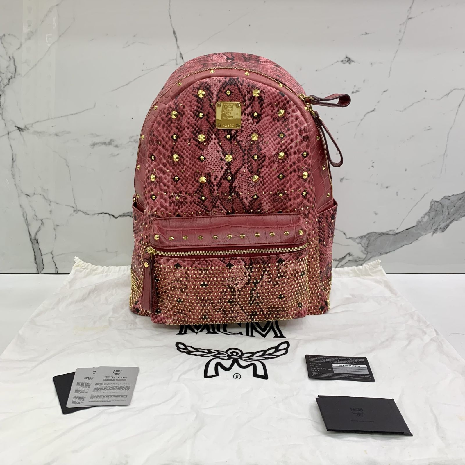 Mcm backpack snakeskin best sale