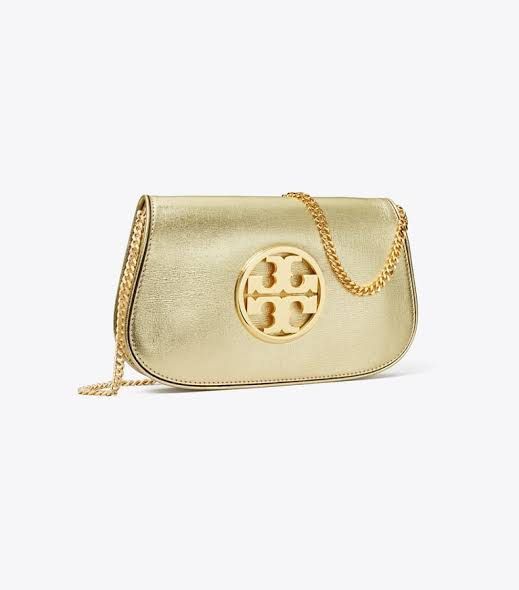 Tory Burch Reva Gold Clutch (Category: Luxury Bags & Wallets) located in San Juan City. Submitted by b.ocampo (Listing ID 1323048738, Image 2). Description: - Tory Burch Reva Clutch (Gold) - Brand new, authentic - Includes chain strap and dust bag - Original price: 29,250 PHP .