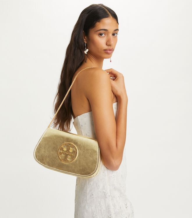 Tory Burch Reva Gold Clutch (Category: Luxury Bags & Wallets) located in San Juan City. Submitted by b.ocampo (Listing ID 1323048738, Image 1). Description: - Tory Burch Reva Clutch (Gold) - Brand new, authentic - Includes chain strap and dust bag - Original price: 29,250 PHP .