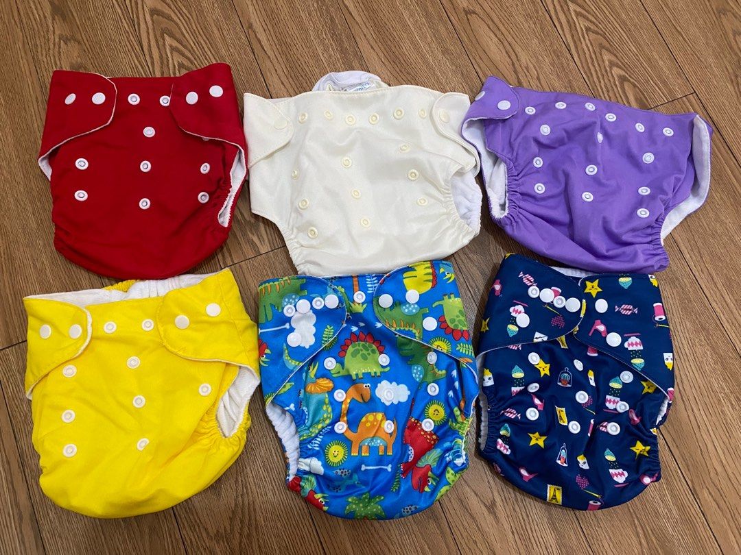 Washable Cloth Diapers (Category: Diapers & Baby Wipes) located in Imus. Submitted by declutterme12 (Listing ID 1322953813, Image 1). Description: Take all W/ inserts (di lang nasama sa pic) Di nagamit.