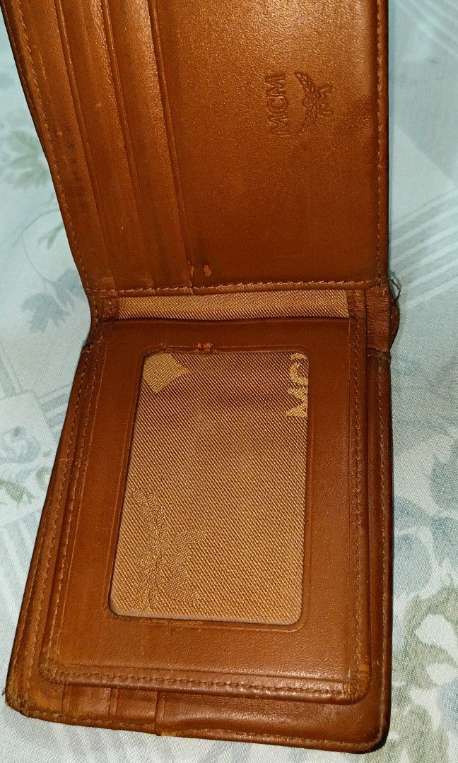 Authentic MCM Men's Wallet (Category: Luxury Bags & Wallets) located in Romblon. Submitted by migustyles (Listing ID 1318197265, Image 3). Description: MCM Men's Wallet Authentic with flaws but bearable with white tag genuine leather.