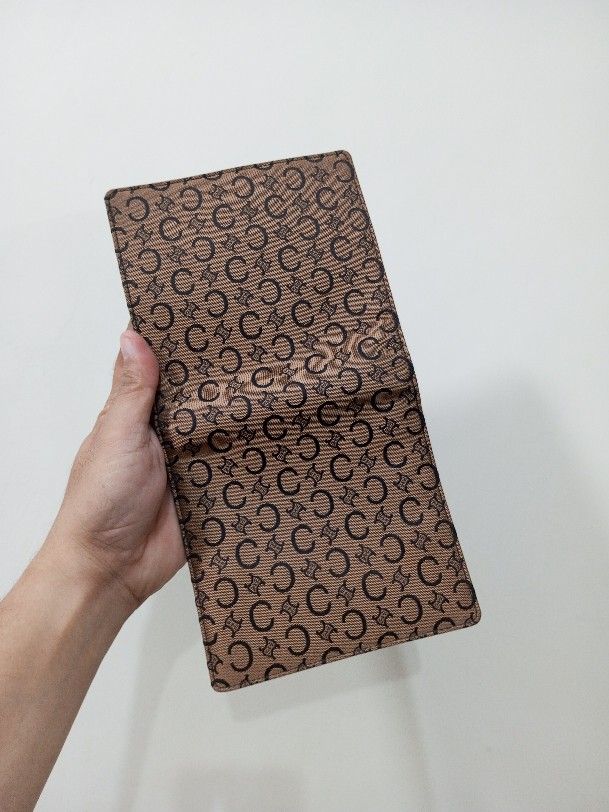 CELINE bifold wallet (Category: Luxury Bags & Wallets) located in Naga. Submitted by queburock (Listing ID 1318154836, Image 1). Description: vintage 90s. used but in very good condition canvas and leather material..