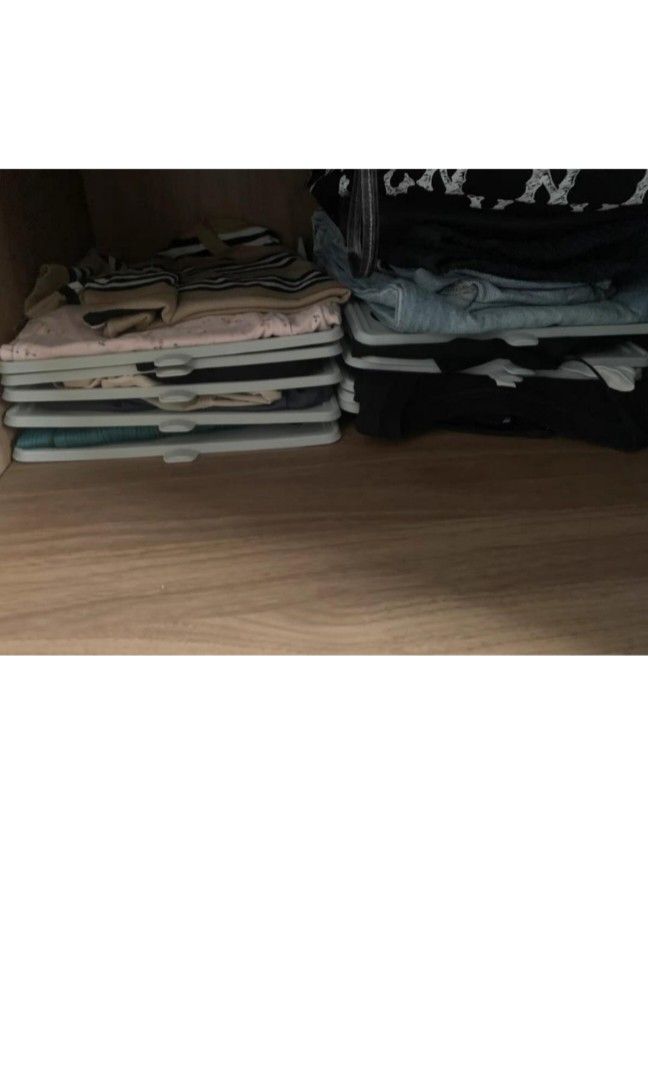 Clothes stacker (Category: Storage Boxes & Baskets) located in Singapore. Submitted by ksstore123 (Listing ID 1318147347, Image 3). Description: sold 13 left 40 pieces! Introducing our innovative cloth stacker, designed to bring order and efficiency to your wardrobe. Perfect for neatly organizing and stacking your clothes, this space-saving solution ensures your garments remain wrinkle-free and easily accessible. Crafted from durable, high-qualit