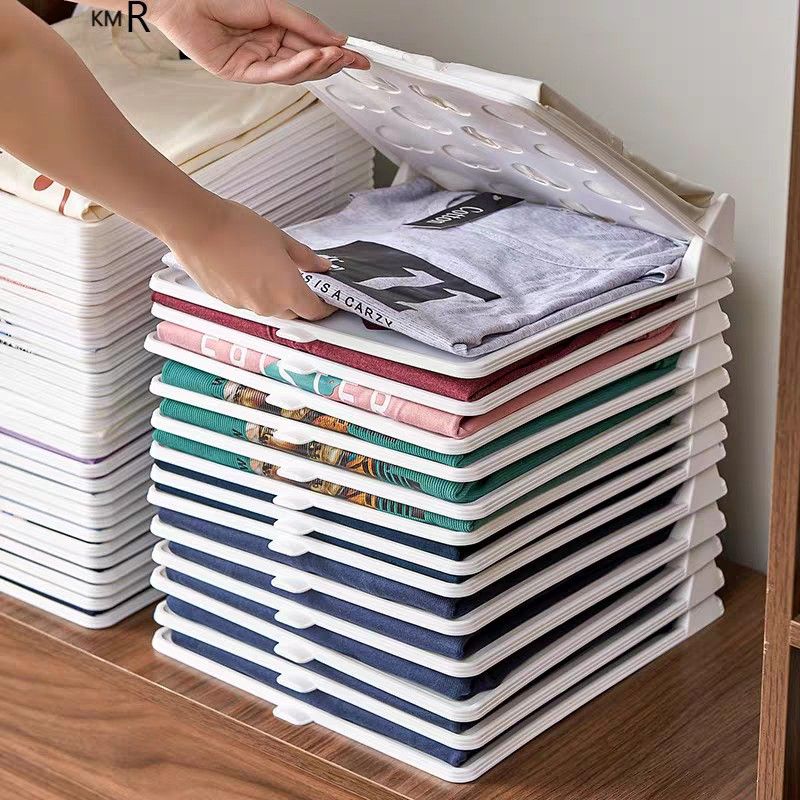 Clothes stacker (Category: Storage Boxes & Baskets) located in Singapore. Submitted by ksstore123 (Listing ID 1318147347, Image 1). Description: sold 13 left 40 pieces! Introducing our innovative cloth stacker, designed to bring order and efficiency to your wardrobe. Perfect for neatly organizing and stacking your clothes, this space-saving solution ensures your garments remain wrinkle-free and easily accessible. Crafted from durable, high-qualit
