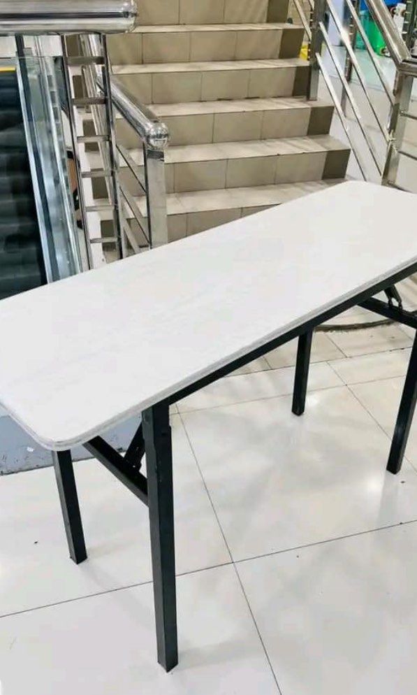 Folding desk / foldable computer table (Category: Tables & Sets) located in Manila. Submitted by kellychz (Listing ID 1318211415, Image 3). Description: Brand new on hand on hand!!! Foldable computer table Available size 80x40 100x40 120x40 100x60 120x60 Cash on delivery/ gcash.