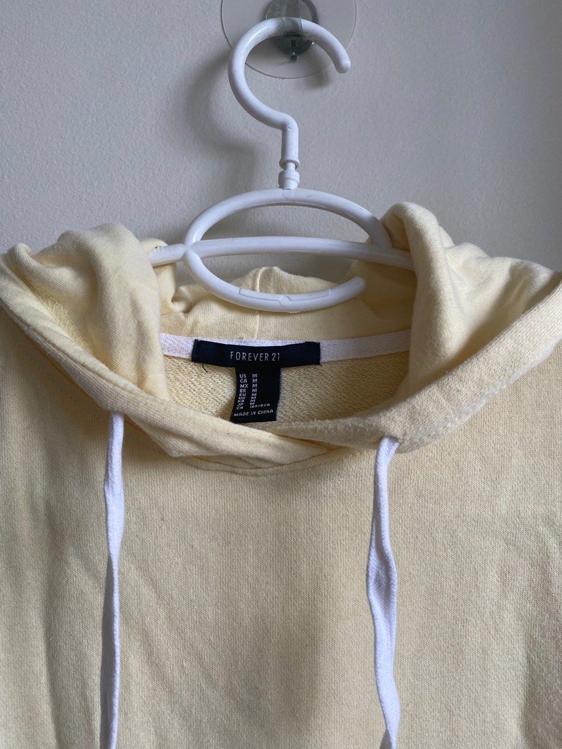 Forever 21 yellow hoodie (Category: Coats, Jackets and Outerwear) located in Pasig City. Submitted by ulit.ulitph (Listing ID 1318121922, Image 3). Description: Forever 21 Pastel yellow hoodie Thick fabric.