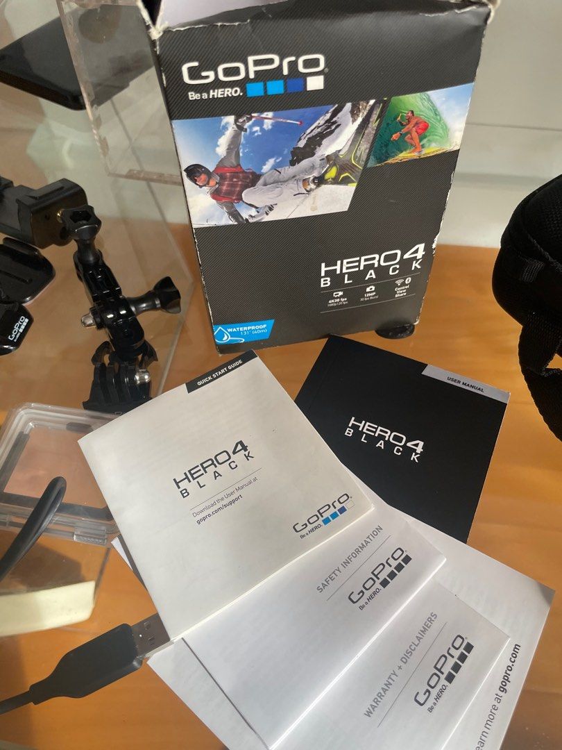GoPro Hero 4 Black (Category: Cameras) located in Taguig. Submitted by Sweettooth888 (Listing ID 1318165488, Image 2). Description: Comes with original packaging and additional accessories i bought online. Only used in cebu/bohol trip long time ago..
