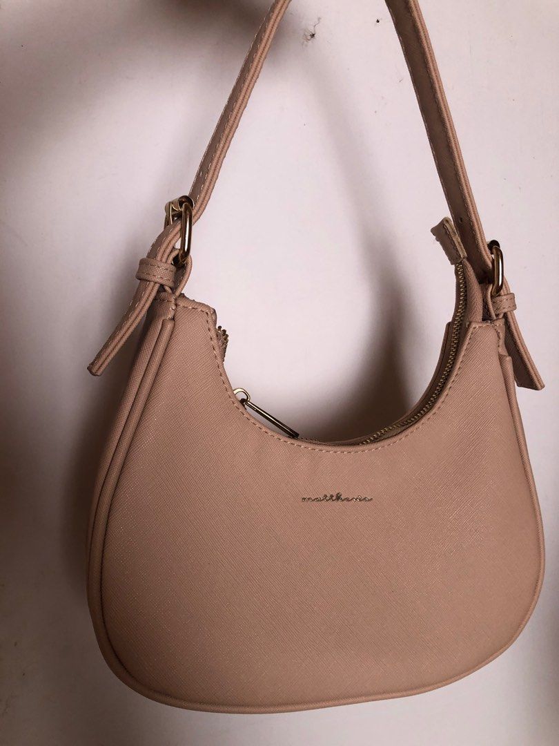 Matthew's Moira Shoulder Bag (Blush) (Category: Shoulder Bags) located in Caloocan City. Submitted by _miumuse (Listing ID 1318132901, Image 2). Description: Can wear it as shoulder/sling bag. Comes with extra strap. No flaws. Bought for 1,299php..