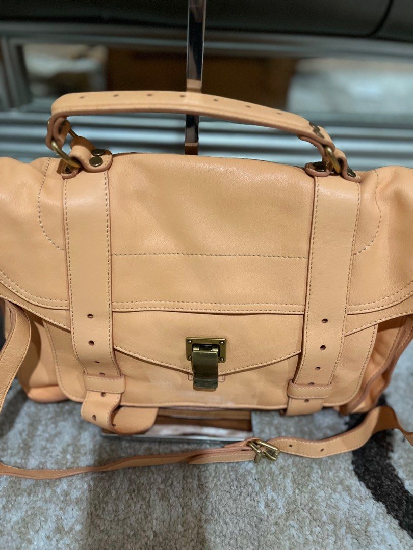 Authentic Proenza Schouler calf leather messenger bag (Category: Luxury Bags & Wallets) located in Makati City. Submitted by rainnes18 (Listing ID 1318226713, Image 2). Description: Brand new calf leather bought in UAE 🇦🇪 Original price is 97k. Complete with Certificate of Authenticity and Dust bag😊.