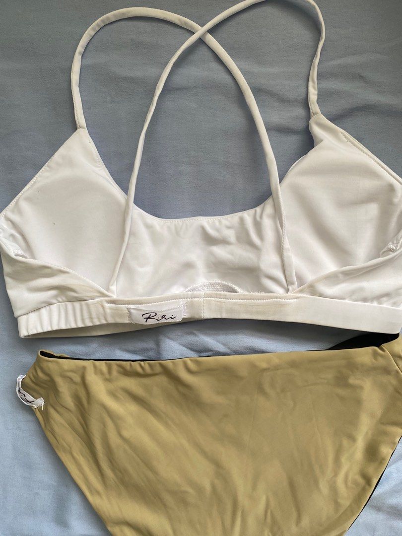 White Nude Mix Bikini Riri Store (Category: Bikinis & Swimsuits) located in Pasig City. Submitted by ulit.ulitph (Listing ID 1318078756, Image 3). Description: THE RIRI STORE (IG) White Bikini Top (delivered with brown marks, seems washable) -SMALL Nude Black Bottom REVERSIBLE - SMALL Never been used Tags: h&m zara mango sew local.