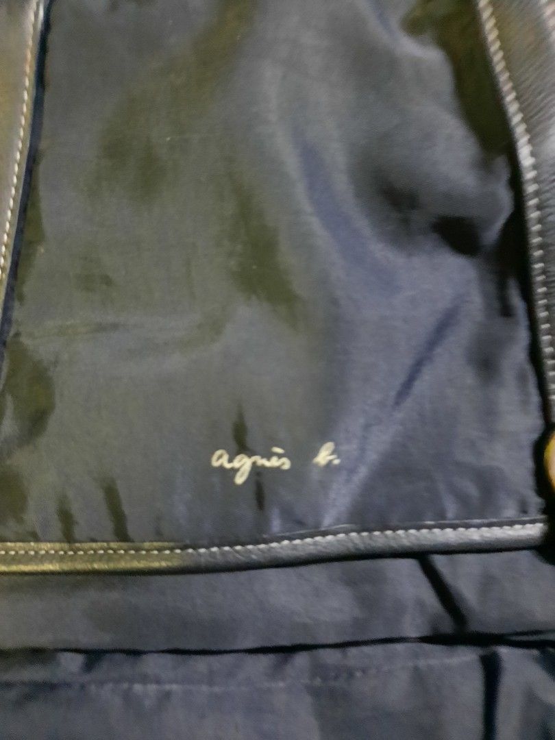 AGNES B. TOTE BAG (Category: Luxury Bags & Wallets) located in Manila. Submitted by smicolen (Listing ID 1318292398, Image 3). Description: AGNES B TOTE NYLON BAG color rate 10/10 like new issue: replace Isa handle nylon L - 14 W - 15 Bottom - 4.