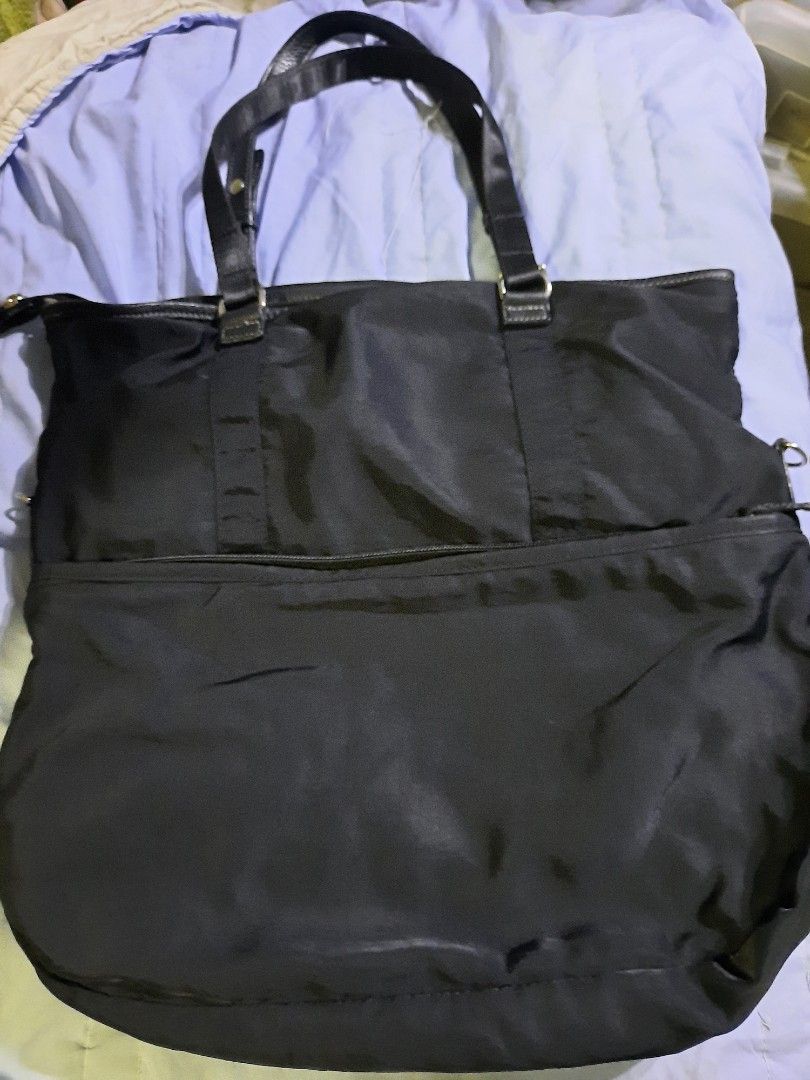 AGNES B. TOTE BAG (Category: Luxury Bags & Wallets) located in Manila. Submitted by smicolen (Listing ID 1318292398, Image 2). Description: AGNES B TOTE NYLON BAG color rate 10/10 like new issue: replace Isa handle nylon L - 14 W - 15 Bottom - 4.