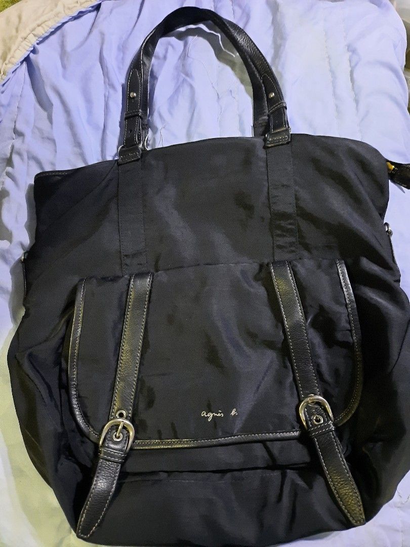 AGNES B. TOTE BAG (Category: Luxury Bags & Wallets) located in Manila. Submitted by smicolen (Listing ID 1318292398, Image 1). Description: AGNES B TOTE NYLON BAG color rate 10/10 like new issue: replace Isa handle nylon L - 14 W - 15 Bottom - 4.