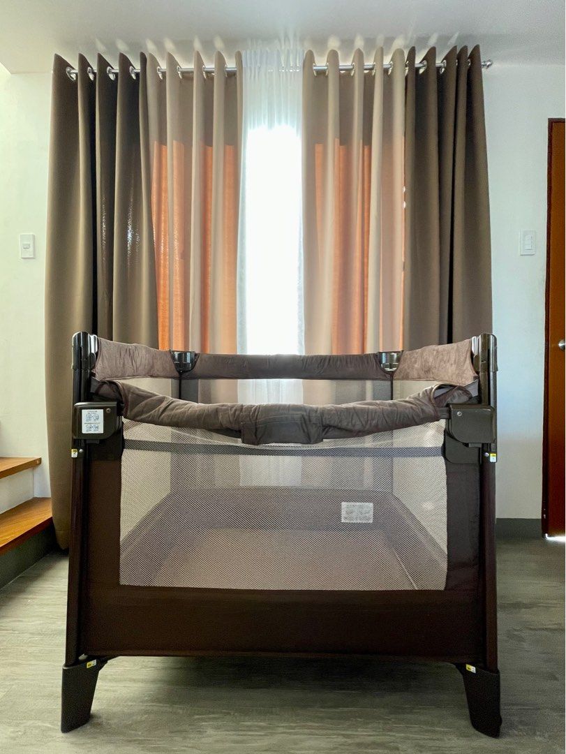 Aprica travel crib online