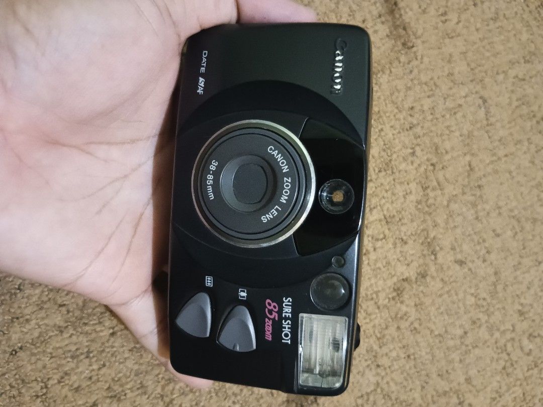 Canon sureshot 85 zoom untested (Category: Cameras) located in Quezon City. Submitted by markgolveo (Listing ID 1318287496, Image 3). Description: Canon sureshot 85 zoom for parts out untested film compartment lock stuck loose.