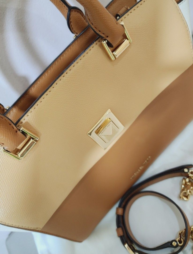 Michael Kors Medium Sylvia Satchel Bag (Category: Cross-body Bags) located in Valenzuela. Submitted by absolutelychick (Listing ID 1318283700, Image 2). Description: L 15" x W 5" x H 8.75" with original dustbag jrs, lbc, j&t lalamove/grab ready.