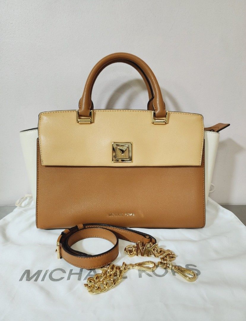 Michael Kors Medium Sylvia Satchel Bag (Category: Cross-body Bags) located in Valenzuela. Submitted by absolutelychick (Listing ID 1318283700, Image 1). Description: L 15" x W 5" x H 8.75" with original dustbag jrs, lbc, j&t lalamove/grab ready.