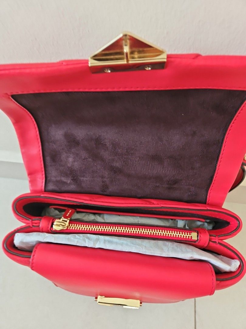 Michael kors red bag with gold chain top
