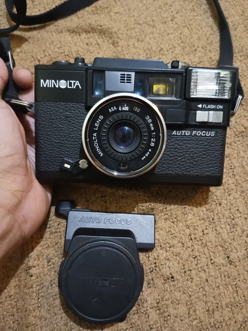 Minolta Hi-Matic AF-D untested defective for parts out (Category: Cameras) located in Quezon City. Submitted by markgolveo (Listing ID 1318304321, Image 1). Description: Minolta Hi-Matic AF-D untested defective for parts out repairs Orr collection display no power signs of wear on battery contacts good clean film compartment and lens lens cap and strap still intact.