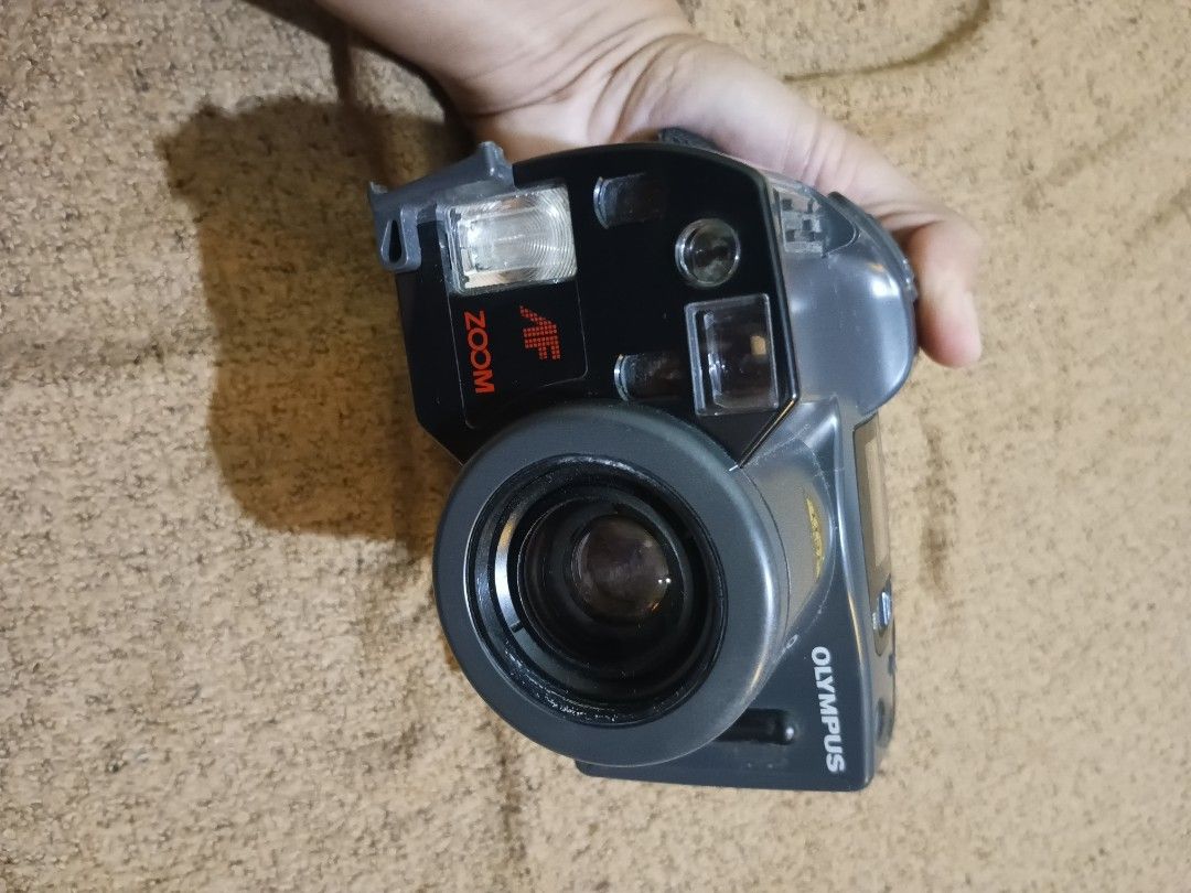 Olympus AZ-300 superzoom - untested (Category: Cameras) located in Quezon City. Submitted by markgolveo (Listing ID 1318302795, Image 2). Description: Olympus AZ-300 superzoom - untested for parts out repairs or collection display good tolerable cosmetic signs of wears good clean film compartment issue - stuck battery compartment broken strap lock plastic in front side of camera see image for reference.