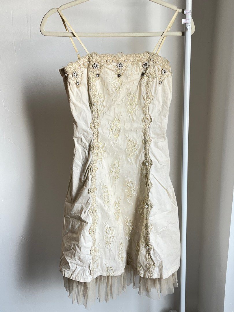 Prinvesscore cream coquette dress (Category: Dresses) located in Davao. Submitted by msfranfine (Listing ID 1318269953, Image 1). Description: Dreamy princesscore coquette dress with beadwork and lace Has stains due to storage not sure if removable but it gives off vintage vibes Tags: cottagecore, y2k.