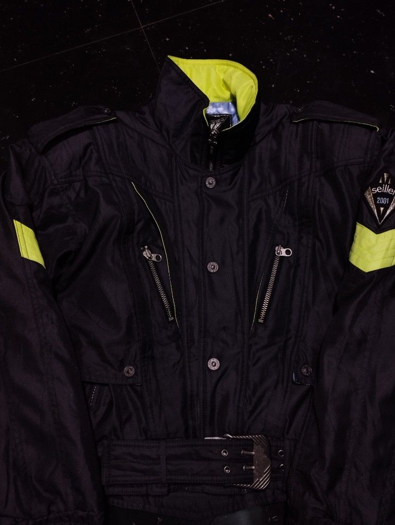 Seiller 2001 Vintage Racing Black Jacket Top (Category: Coats, Jackets and Outerwear) located in Pasig City. Submitted by tenggp (Listing ID 1318351048, Image 1). Description: Seiller 2001 Vintage Racing Jacket - Large on tag - Never been used. Sinukat lang. - Vintage - No issue! No flaws Color rate 10/10 parang bago talaga - Detachable Sleeves so pwedeng vest ang atake - Racing / Motor Rides Jacket siya kaya matibay (Safe from accidents) and hin