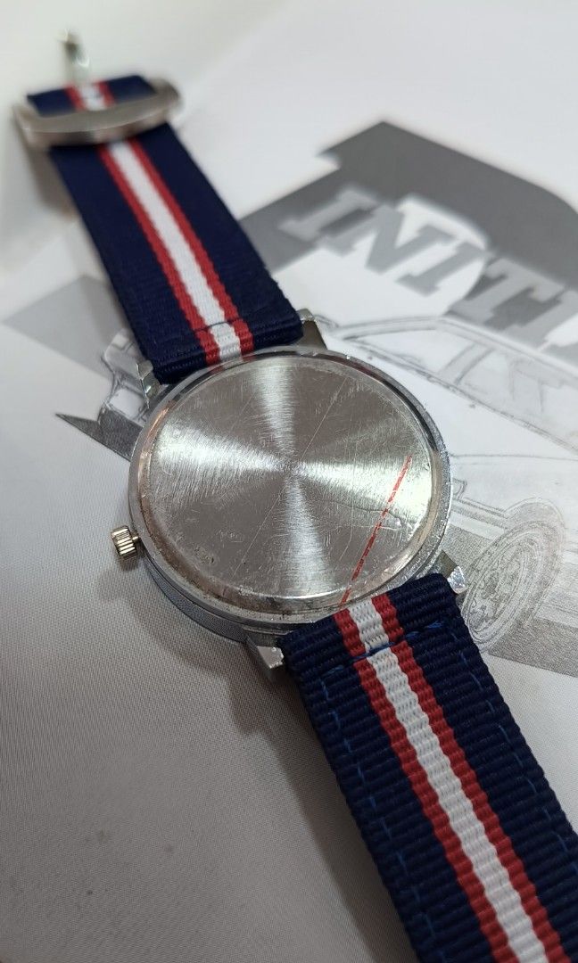 24 01 Quartz Watch Gray Dial (Category: Luxury Watches) located in Quezon City. Submitted by timecheckph (Listing ID 1318546632, Image 3). Description: FOR SALE: 24 01 Quartz Watch Gray Dial PRICE: Php 1,950 Brand new, unworn 40mm solid stainless steel case size No-date configuration Two Way pepsi sailscloth strap Bauhaus design, very rare configuration Please send a PM here..
