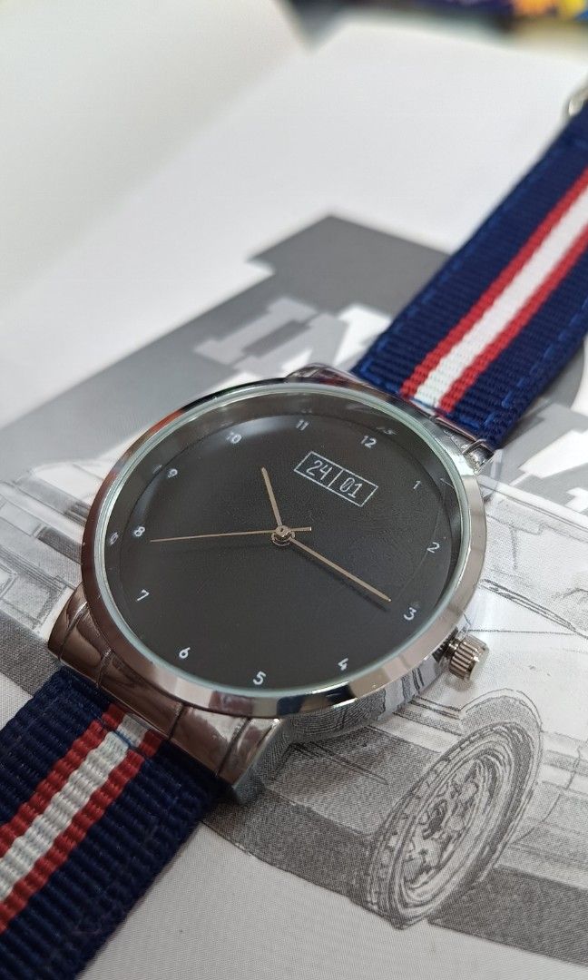 24 01 Quartz Watch Gray Dial (Category: Luxury Watches) located in Quezon City. Submitted by timecheckph (Listing ID 1318546632, Image 2). Description: FOR SALE: 24 01 Quartz Watch Gray Dial PRICE: Php 1,950 Brand new, unworn 40mm solid stainless steel case size No-date configuration Two Way pepsi sailscloth strap Bauhaus design, very rare configuration Please send a PM here..
