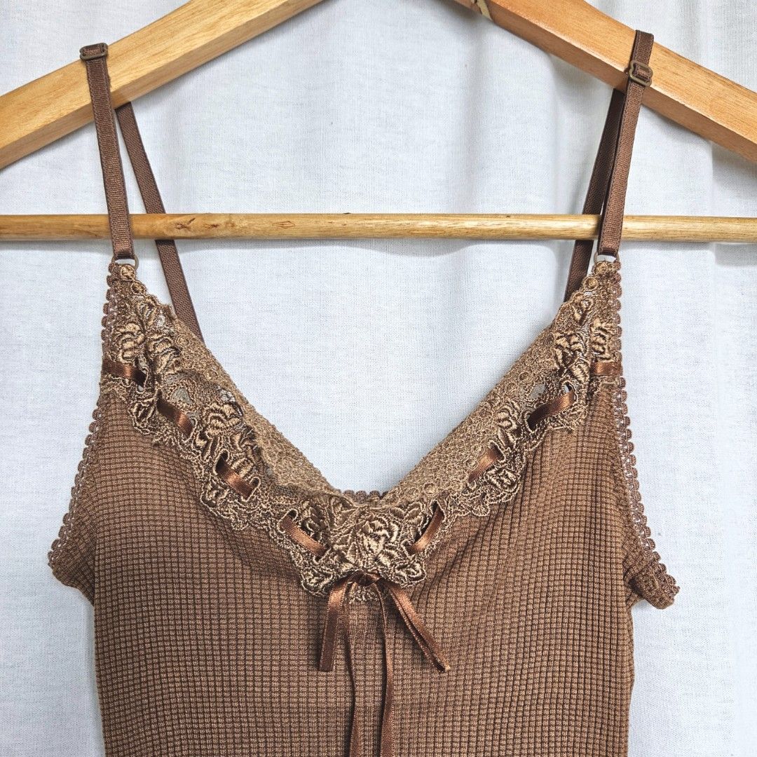 BROWN STRETCHY SPAGHETTI TOP (Category: Others Tops) located in Carmona. Submitted by simplestashph (Listing ID 1318515094, Image 3). Description: Z-17 BROWN STRETCHY SPAGHETTI TOP C 26, L 15 PHP 100.