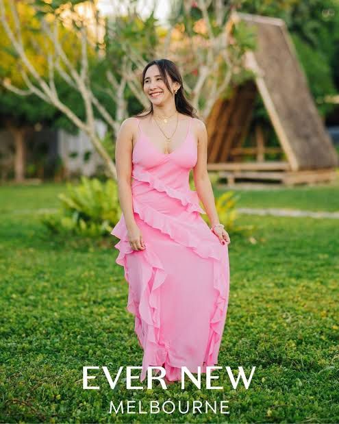 Evernew Ruffle Pink Long dress (Category: Evening dresses & gowns) located in Manila. Submitted by ExquisiteCloset21 (Listing ID 1318599036, Image 2). Description: 💗Super Flattering! Flowy long dress 💗Can pass as brandnew! With tag, receipt and paper bag. Complete! 💗Used only once for a wedding. (5hrs) 💗Message me for more photos. .