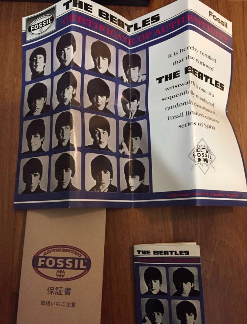 FREE TRACKABLE SHIPPING AND NEW AND NEVER USED Vintage 1998 Limited Edition Fossil The Beatles Watch only 5000 ever released and with unique serial