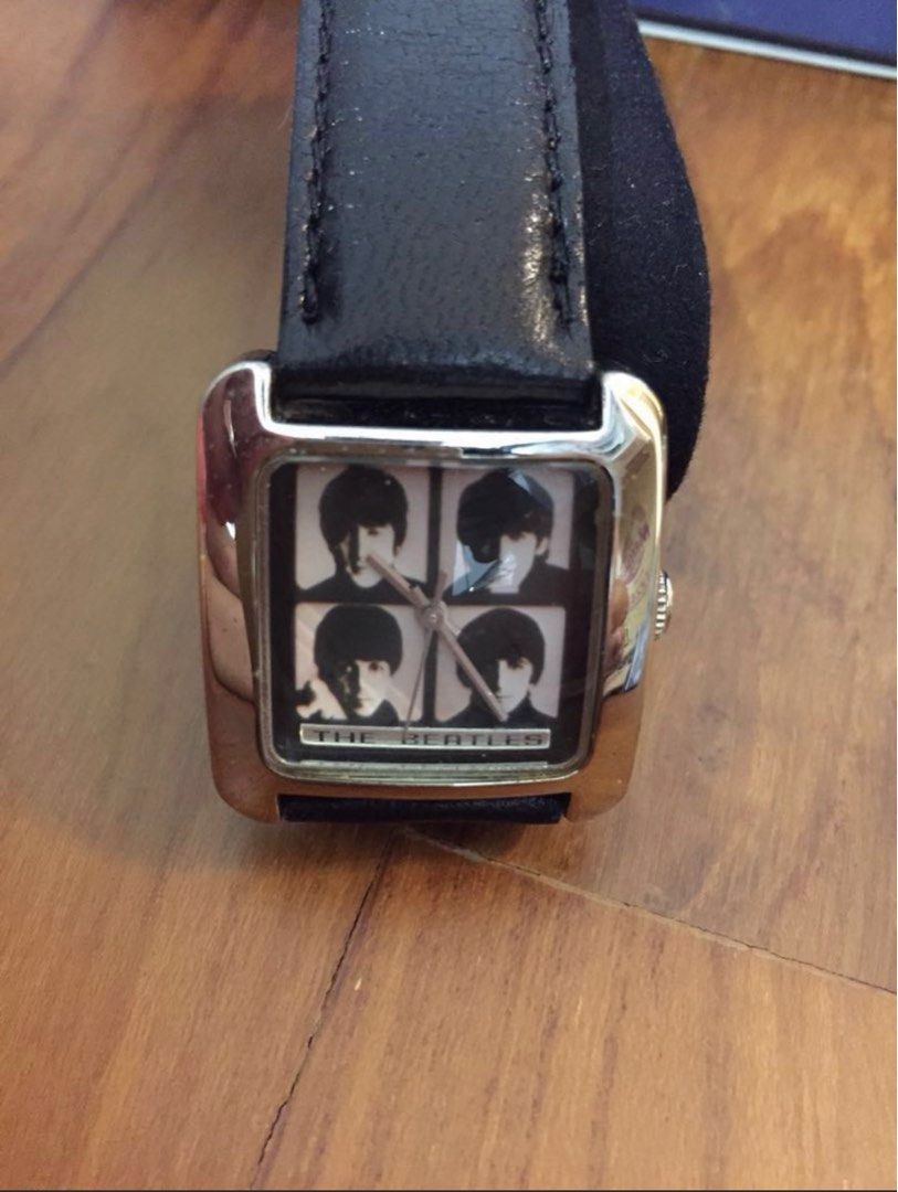 FREE TRACKABLE SHIPPING AND NEW AND NEVER USED Vintage 1998 Limited Edition Fossil The Beatles Watch only 5000 ever released and with unique serial