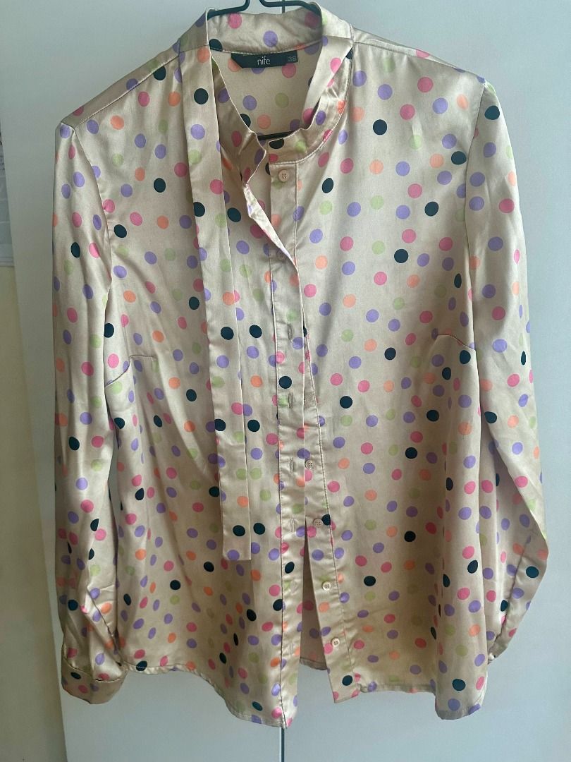 NIFE Satin Longsleeves Blouse with a Bow in Printed Dots Pattern (Medium) (Category: Longsleeves) located in Taguig. Submitted by jetsetlife (Listing ID 1318475189, Image 1). Description: PRELOVED - NIFE Long sleeves blouse with a printed dots pattern - Round neck finished with a bow - Size: Medium / EU 38 / UK 10 / US 6 - Top quality and materials - Sophisticated design - Perfect for smart casual or work days - Made in Poland - Used twice only P