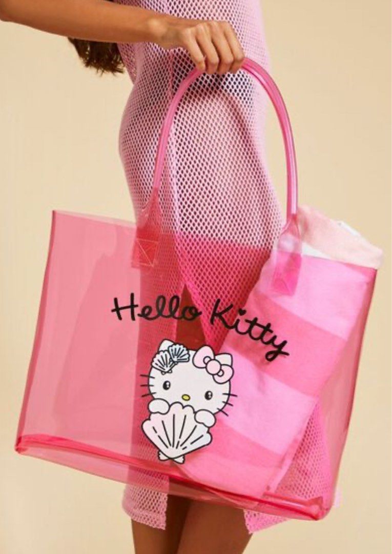 Seashell Hello Kitty Jelly Tote Bag (Category: Shoulder Bags) located in Manila. Submitted by avenue.de.belle (Listing ID 1318613385, Image 2). Description: Hello Kitty and Friends x Forever 21 collection BRAND NEW ONHAND This jelly tote bag features “Hello Kitty” text, front Hello Kitty and seashell graphics, a transparent construction, and top handles. - © 2024 SANRIO CO., LTD. Used Under License Content + Care - 100% polyurethane - Hand wash c