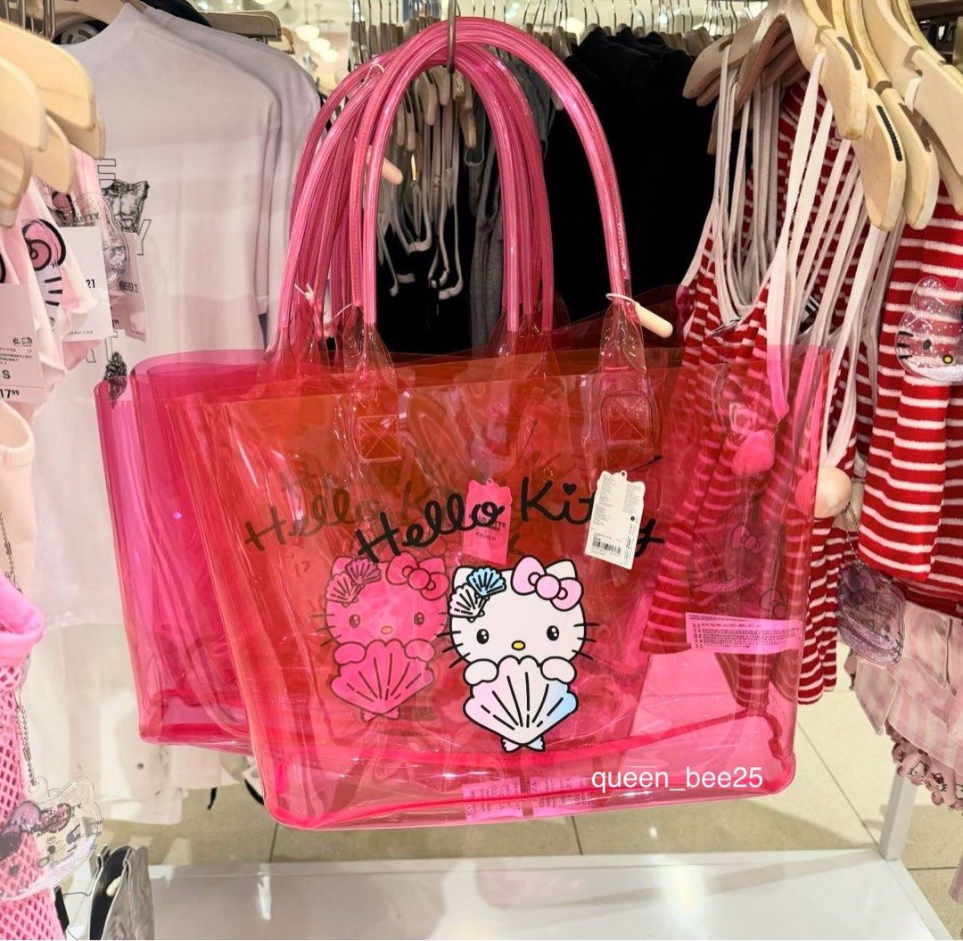 Seashell Hello Kitty Jelly Tote Bag (Category: Shoulder Bags) located in Manila. Submitted by avenue.de.belle (Listing ID 1318613385, Image 3). Description: Hello Kitty and Friends x Forever 21 collection BRAND NEW ONHAND This jelly tote bag features “Hello Kitty” text, front Hello Kitty and seashell graphics, a transparent construction, and top handles. - © 2024 SANRIO CO., LTD. Used Under License Content + Care - 100% polyurethane - Hand wash c